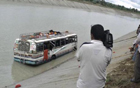 21 killed as bus falls into canal